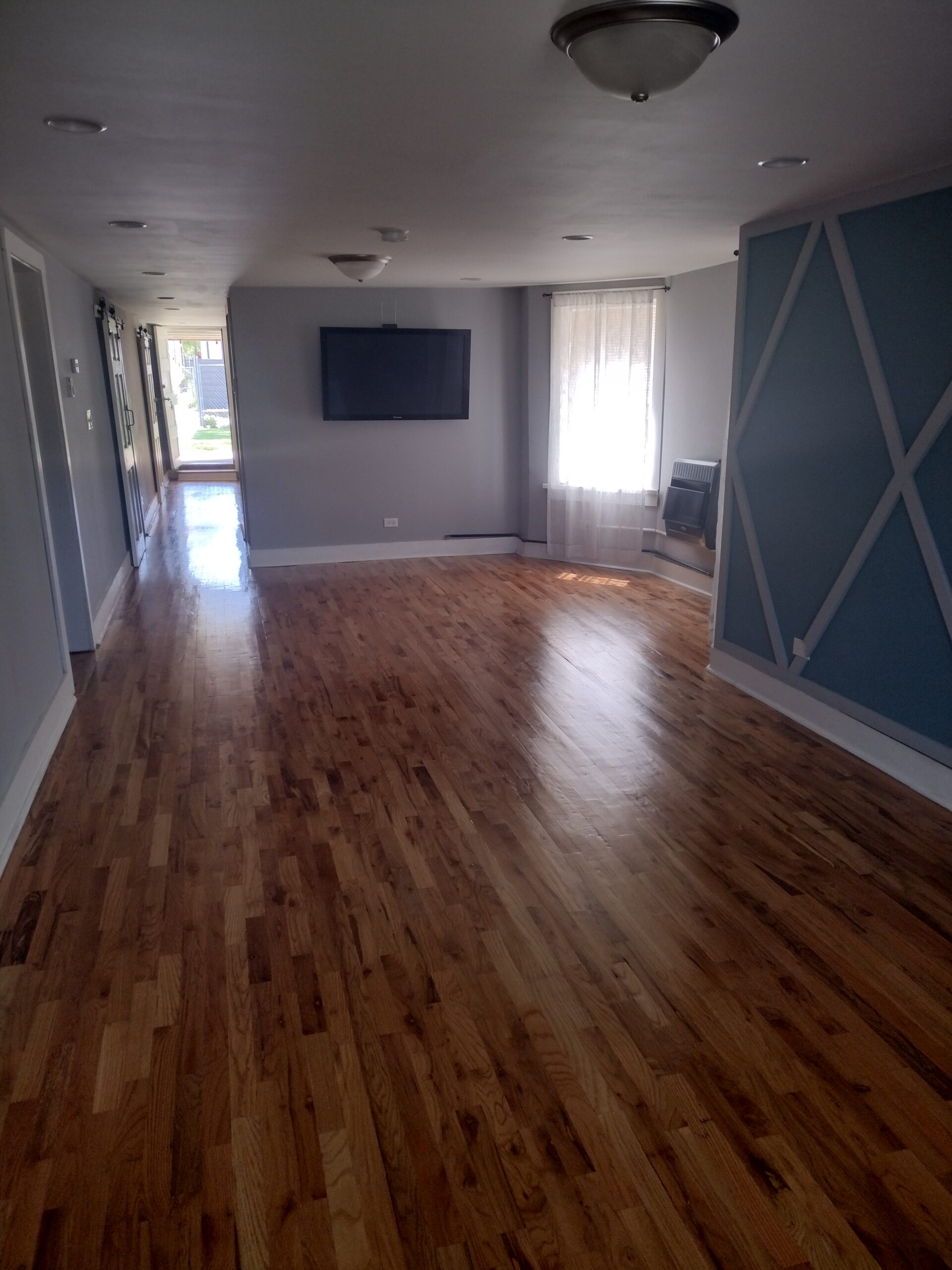 Detailed deep cleaning — scrubbing tile and grout with rubber gloves and a brush