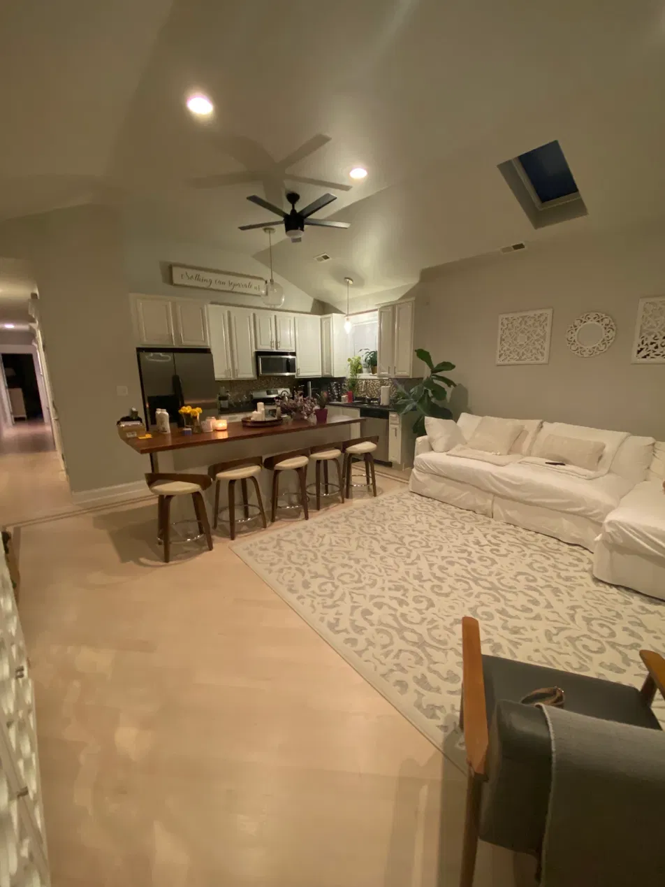 Bright, clean living room and kitchen after recurring cleaning by Super Clean Home Services in Chicago